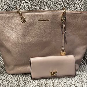 Michael Kors light pink purse with matching wallet